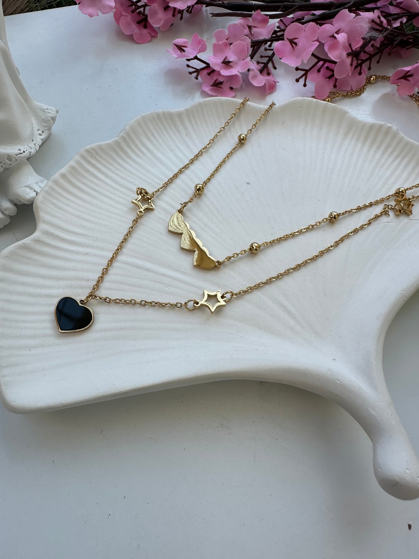 Double layered heart and star pendant