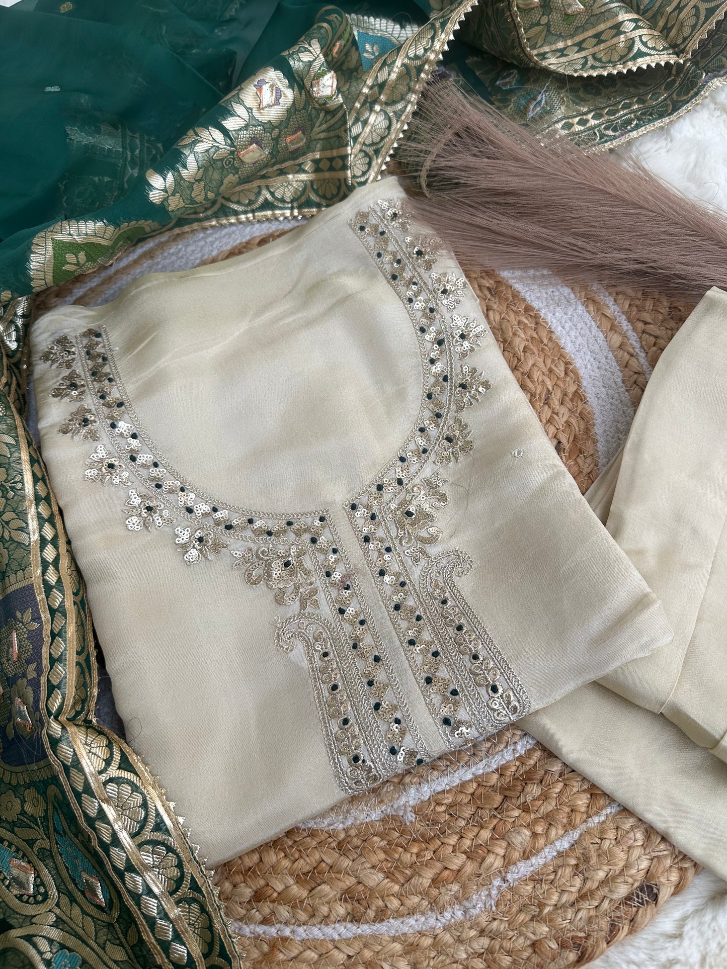 Off-white unstitched suit set with green dupatta