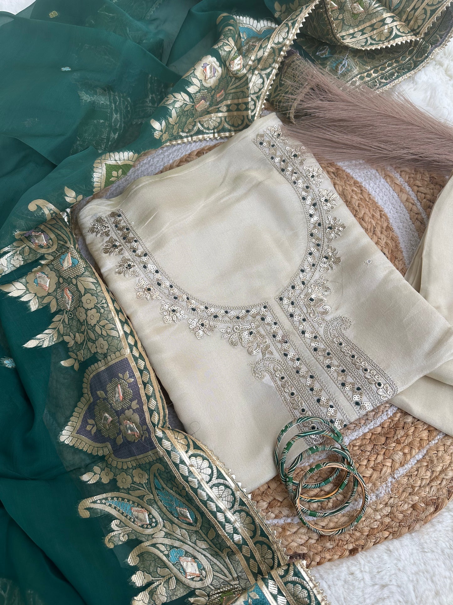 Off-white unstitched suit set with green dupatta