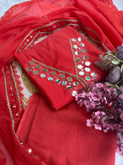 Red Mul Cotton Unstitched Suit Set with Intricate Mirror Work Detailing