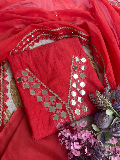 Red Mul Cotton Unstitched Suit Set with Intricate Mirror Work Detailing