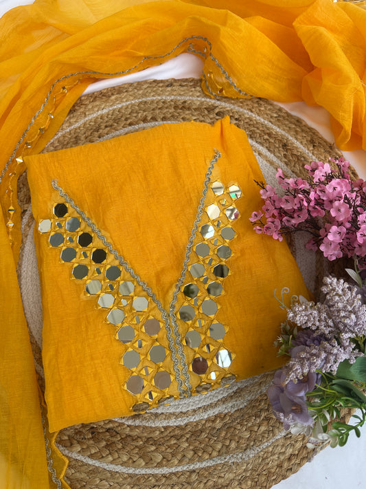 Yellow Mul Cotton Unstitched Suit Set with Intricate Mirror Work Detailing