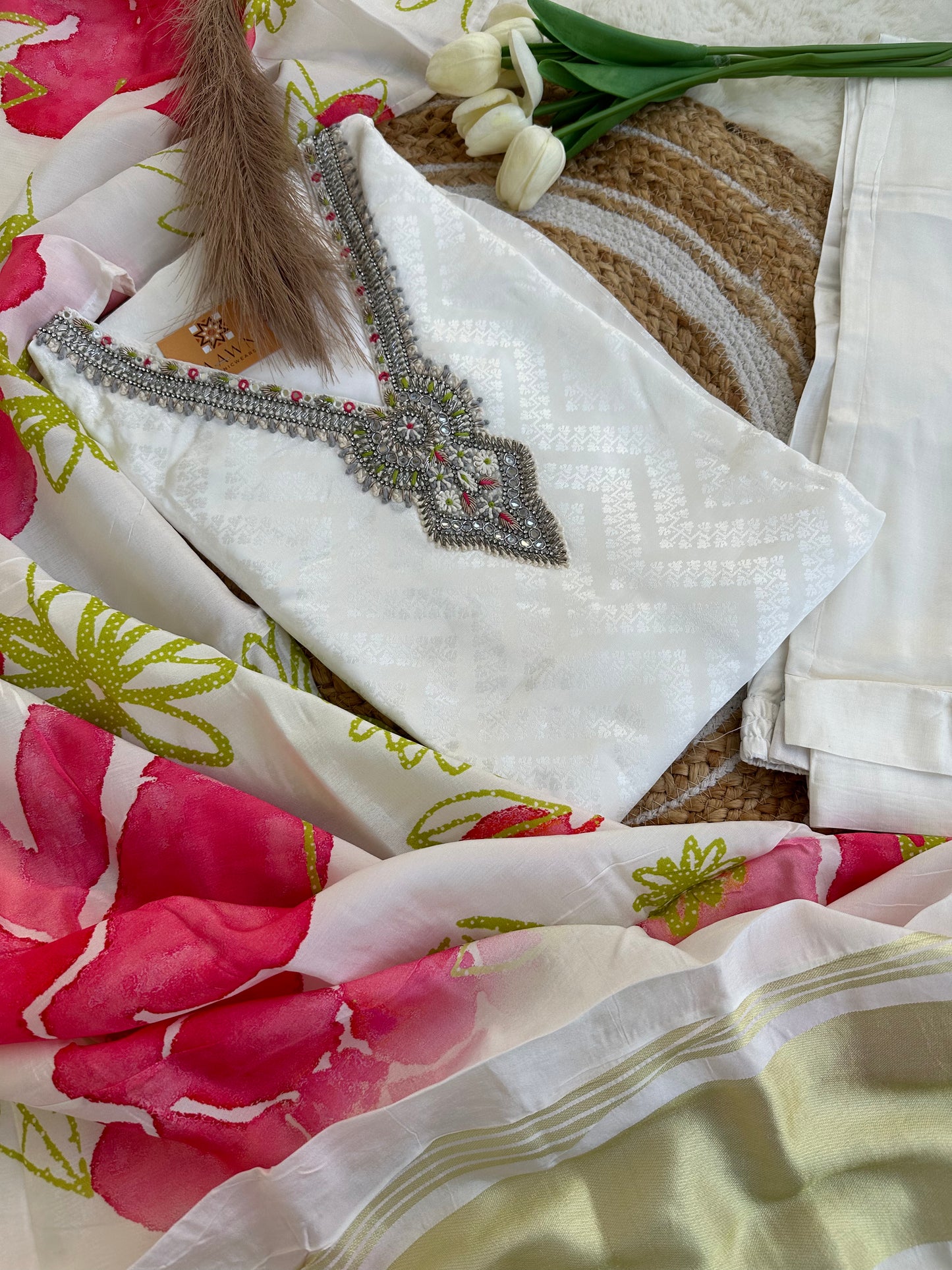 White kurta with pant and floral print dupatta