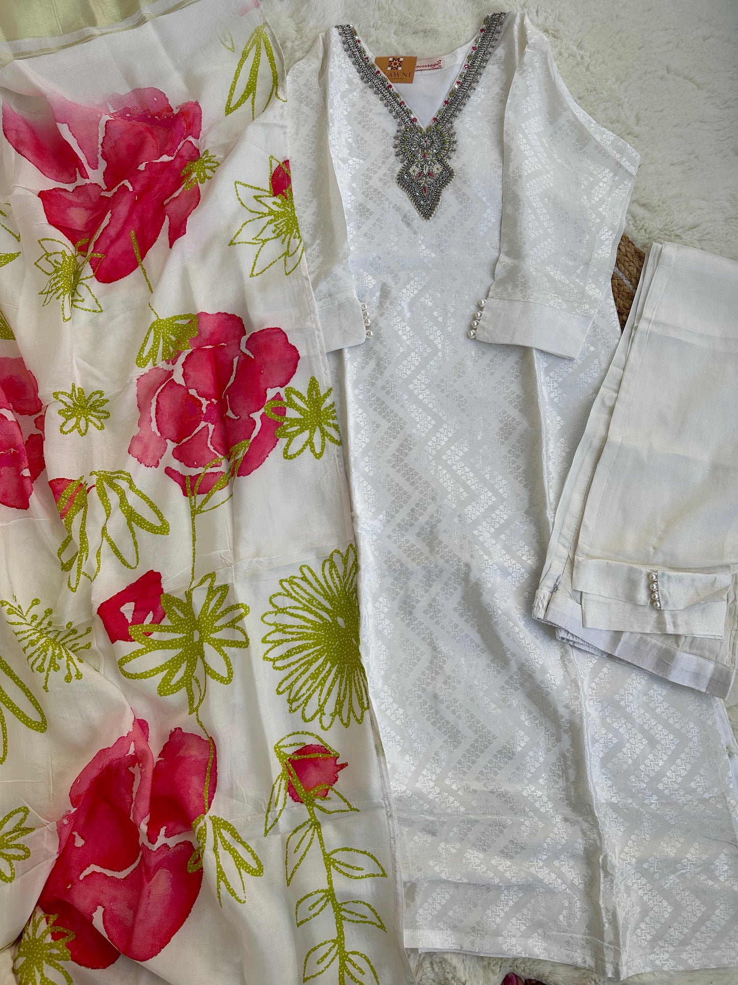 White kurta with pant and floral print dupatta