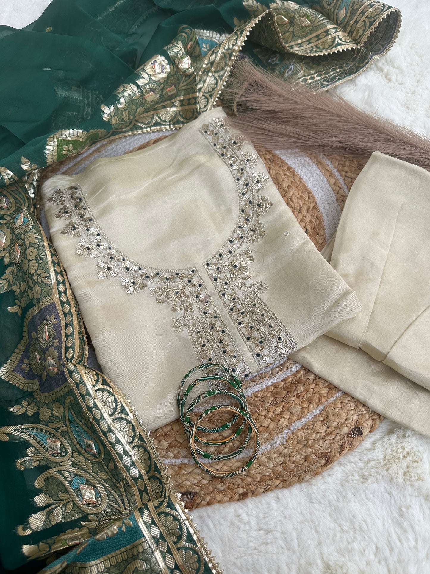 Off-white unstitched suit set with green dupatta