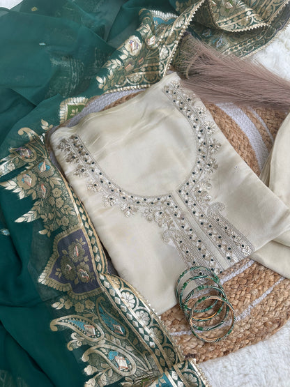 Off-white unstitched suit set with green dupatta