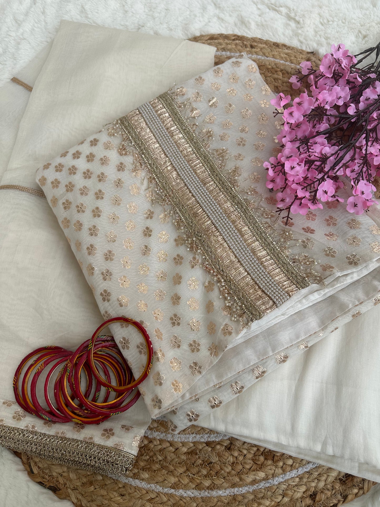 Beautiful off-white unstitched suit with golden work